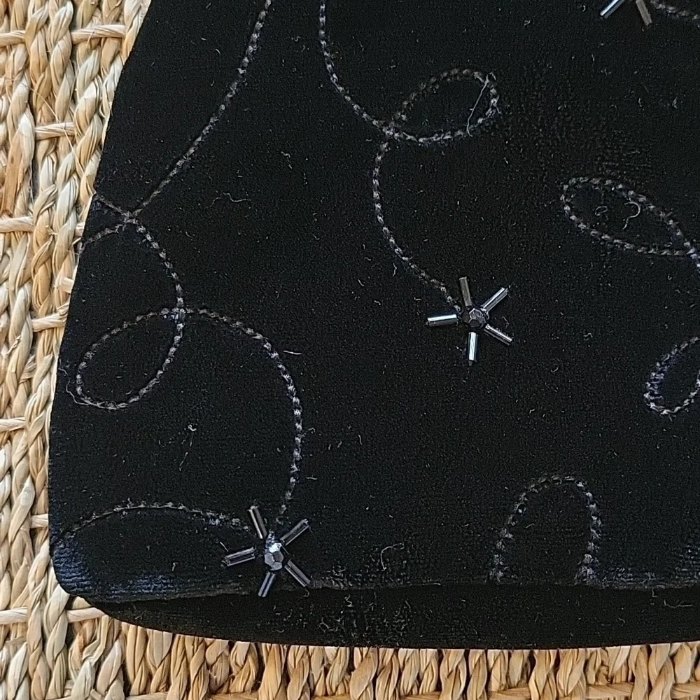 LITTLE black velvet purse with velvet straps and beads.  Tag says gymboree.